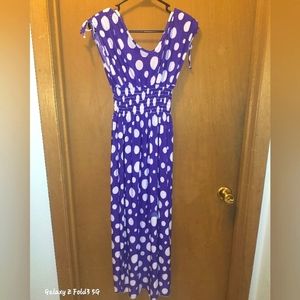 Purple and white polkadot dress. Full length.